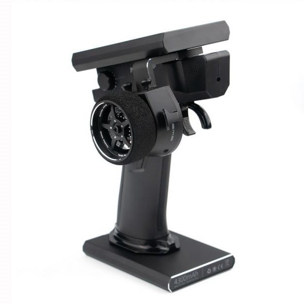Flysky Noble NB4+ RC transmitter with FGr4B receiver, featuring a sleek black design and multiple control switches.