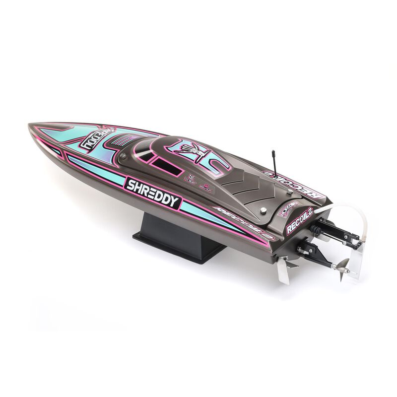 Proboat Heatwave Recoil 2 V2 26-inch self-righting boat with sleek design and vibrant colors floating on water.