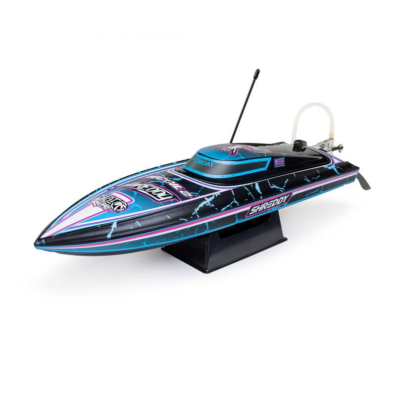 Proboat Recoil 2 18-inch self-righting brushless deep-V RC boat on water, showcasing its sleek design and vibrant colors