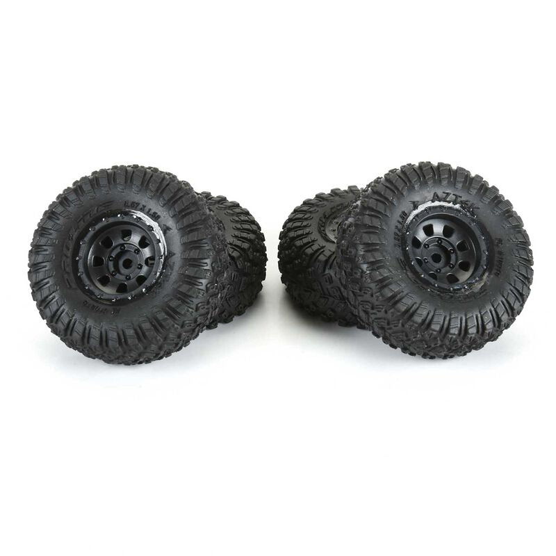 Proline 1/30 Aztek front and rear mounted black Clobber tires for SCX30 radio control truck.