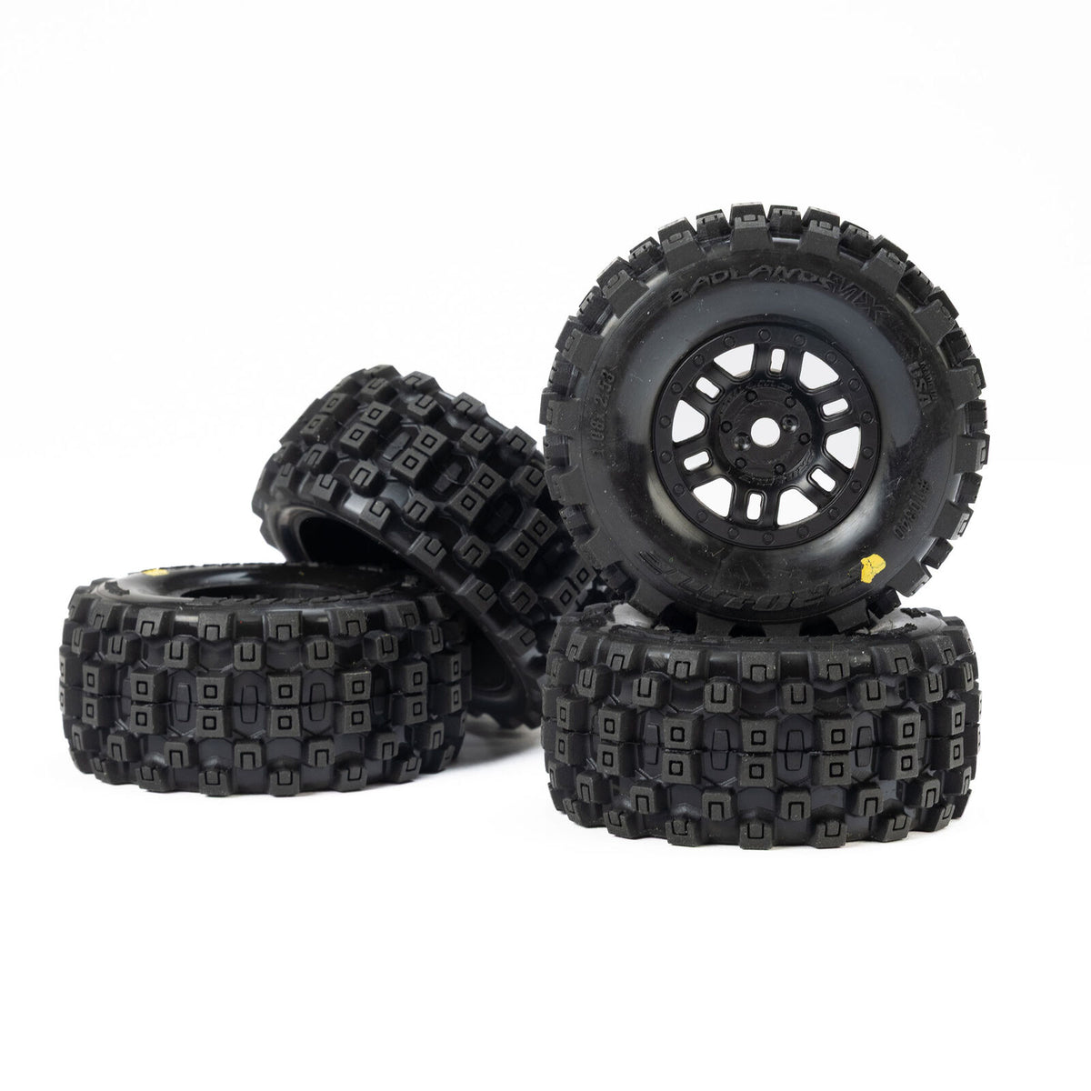 Set of four Proline Badlands MX front and rear tires for Mojave GROM, durable off-road motocross tires with aggressive tread.
