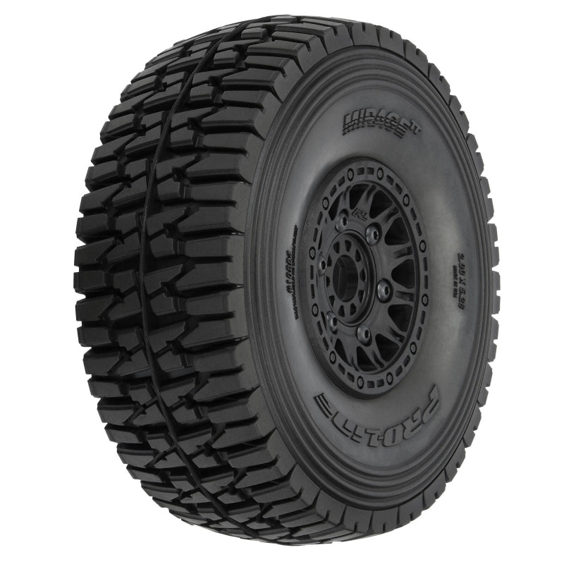 Pro Line Mirage TT 1/7 scale pre-mounted tires with 17mm wheels for remote control truck racing, shown on a racing vehicle.