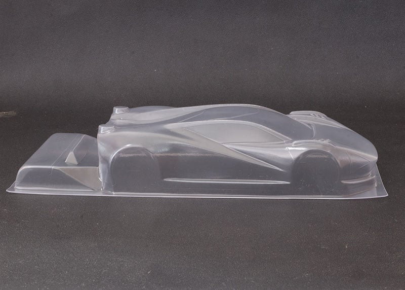 Reflex Racing RAD004 Mako X 1/28 scale Lexan RC car body with aerodynamic design and clear finish.