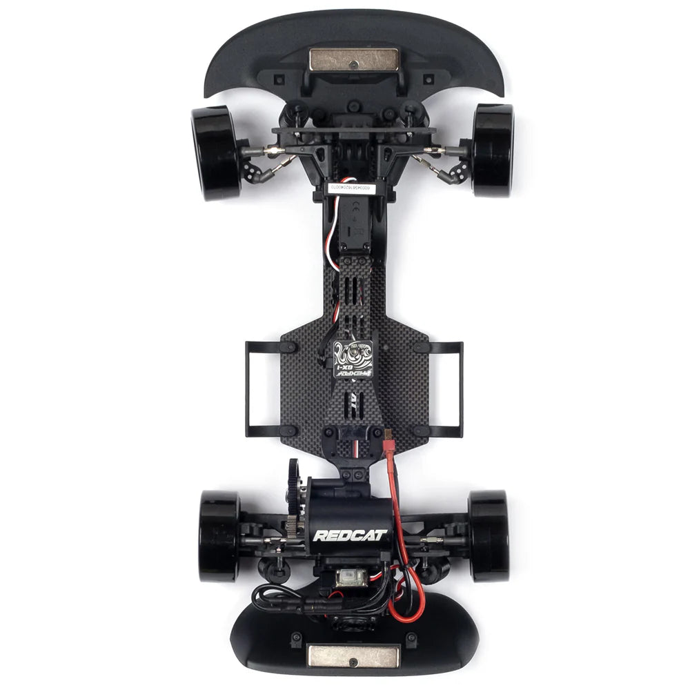 Redcat RDS 1/10 scale 2WD drift car chassis with red and black design, showcasing the sleek competition spec RC drift vehicle.
