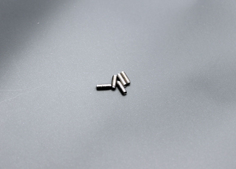Reflex Racing RX28-040 M2x6mm set screws for RC car parts, showing a close-up of the small metal screws on a white background.