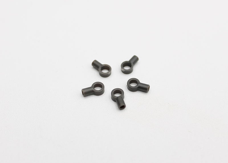Reflex Racing RX28G2 ball cups for RC cars, showing close-up of black plastic RC car parts with detailed focus on connectors.