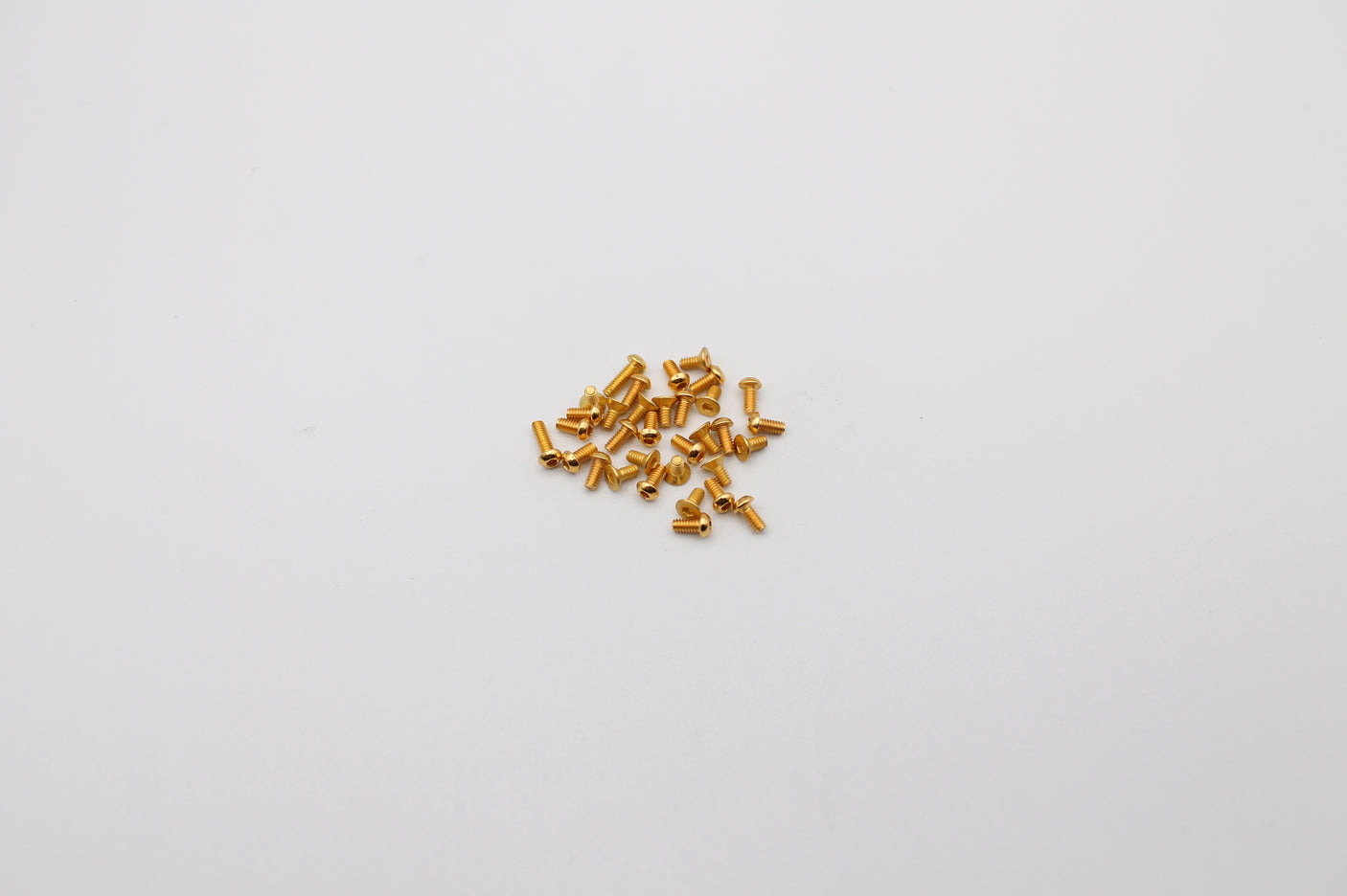 Reflex Racing RX28A-13 gold screw kit for RC car parts, featuring shiny gold screws and hardware for RC vehicle assembly.