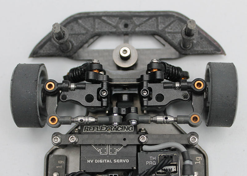 Reflex Racing RX28A-41 short steering horn for RC car, metal construction with mounting holes, compatible with RX28 model vehicles.