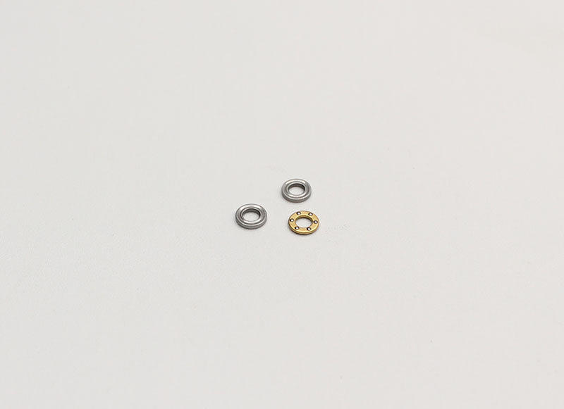 Reflex Racing RX515V2-2 V2 Thrust Bearing showing metal construction and precise fit for high-performance RC vehicles.