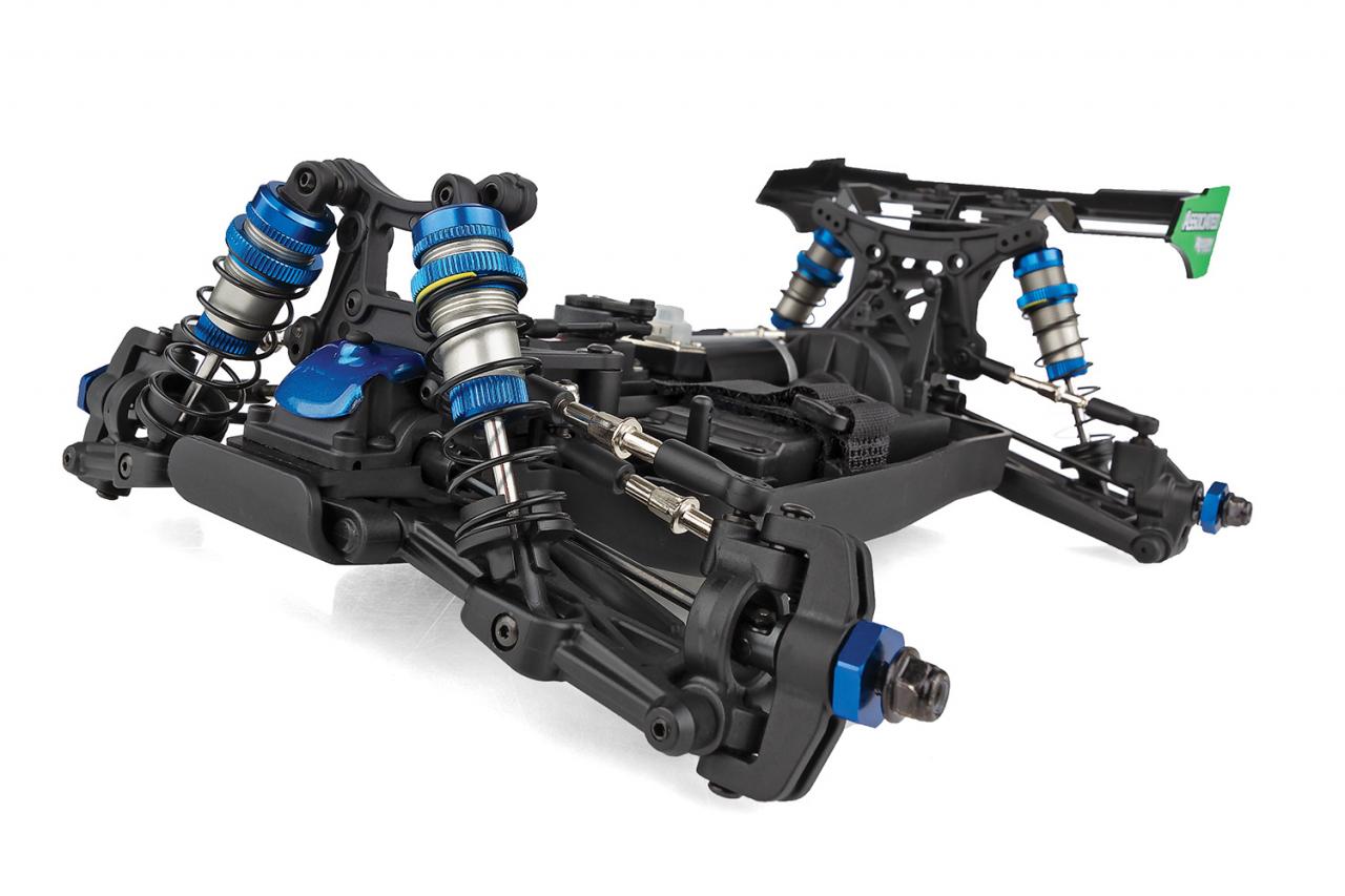 Team Associated Reflex 14B RC buggy kit with detailed chassis and tires, ready for off-road racing.