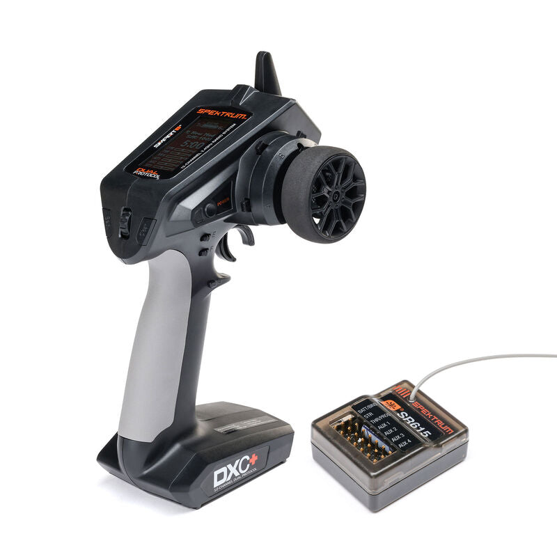 Spektrum DXC+ 12-channel DSMR transmitter with SR615 receiver, featuring multiple control sticks and display screen.