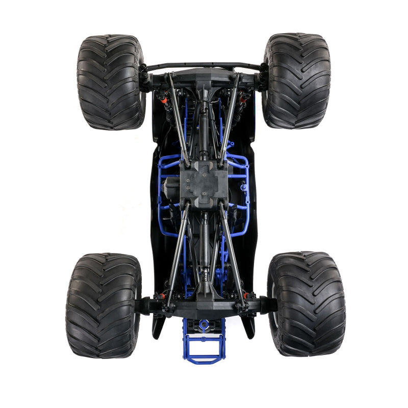 Losi Son-Uva Digger LMT 2.0 1/8 scale remote control monster truck on a dirt track, showing its rugged design and large tires.