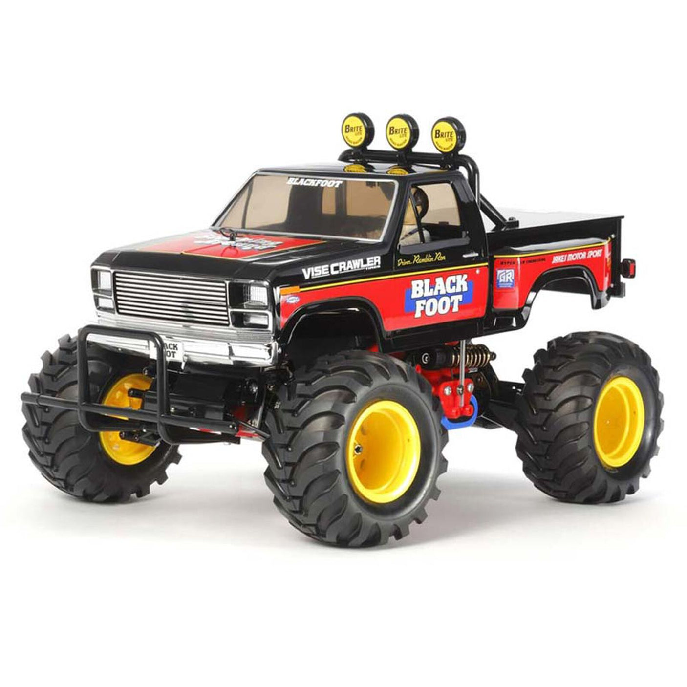 Tamiya 1/10 Blackfoot 2WD Monster Truck Kit model with detailed black and orange design and off-road tires.