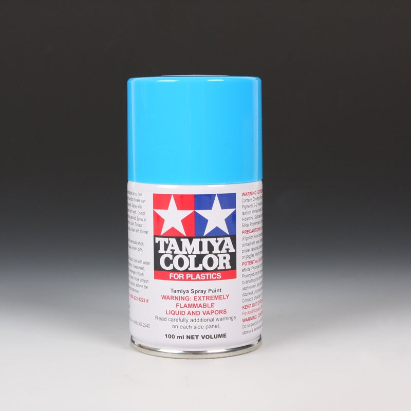 Tamiya TS-23 Light Blue spray paint in a 100ml can, showing the blue aerosol with spray nozzle and label.