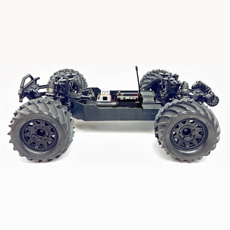 Tekno MT410 2.0 1/10 scale electric 4x4 Pro monster truck kit showing the detailed chassis and large tires.