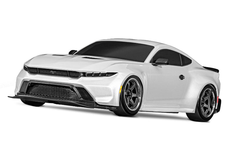 White Traxxas 4-Tec Drift Ford Mustang remote control car on a track, showcasing its detailed body and racing design.