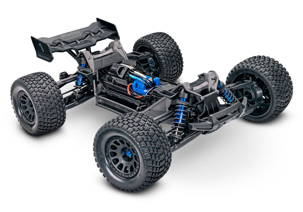 Orange Traxxas XRT 8S RC truck with rugged tires and detailed body, designed for high-performance off-road driving.
