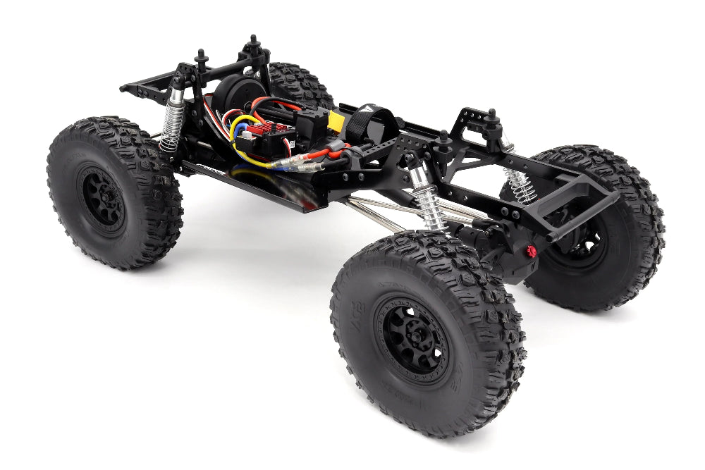 Vanquish VRD Stance 4x4 RTR crawler showing rugged off-road tires, detailed suspension, and durable chassis for remote control rock crawling.
