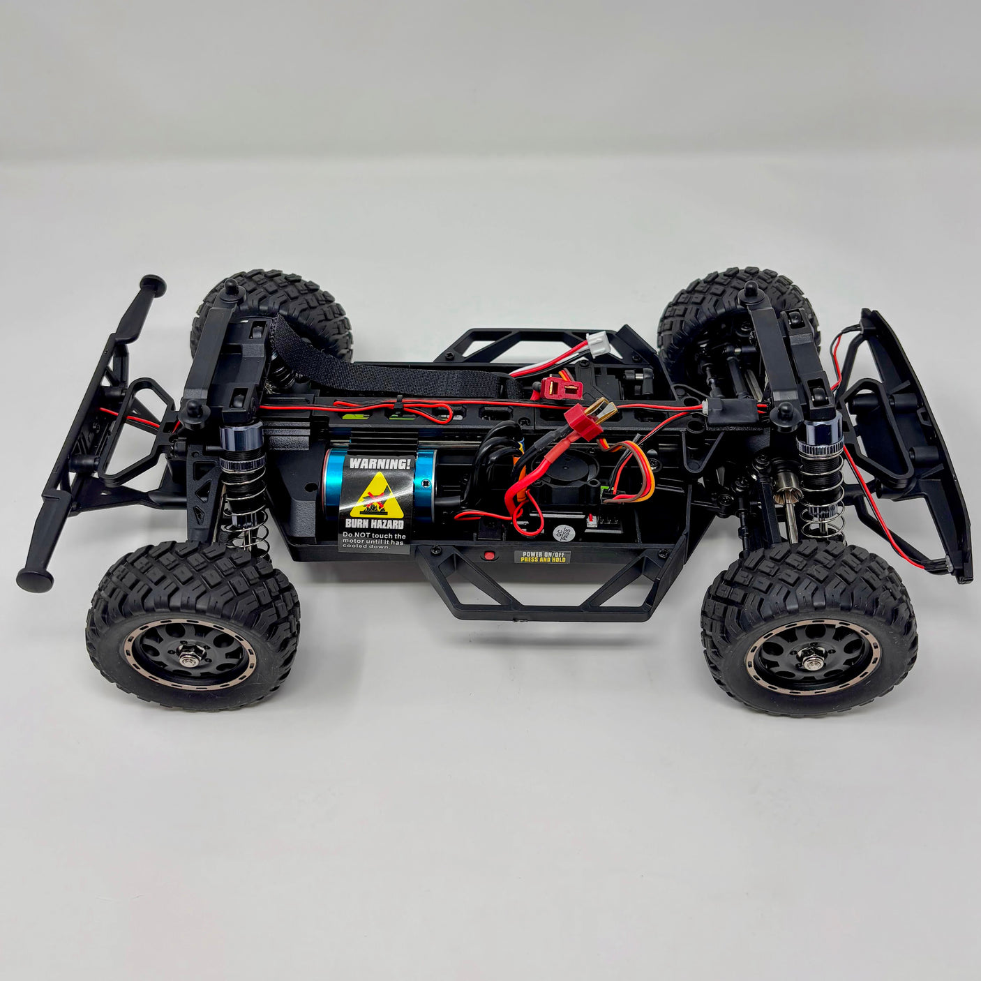 HPI Racing Blackzon Vyper SC Turbo 1/16 4WD electric RC truck with brushless motor and sleek black design.