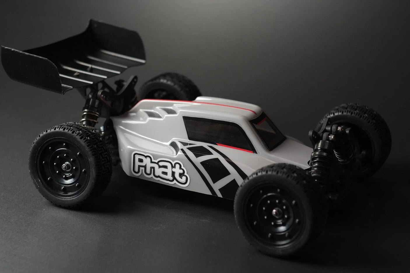 Phat Bodies ATAK RC buggy body for 190mm wheelbase, featuring detailed design and aerodynamic shape for remote control car racing.