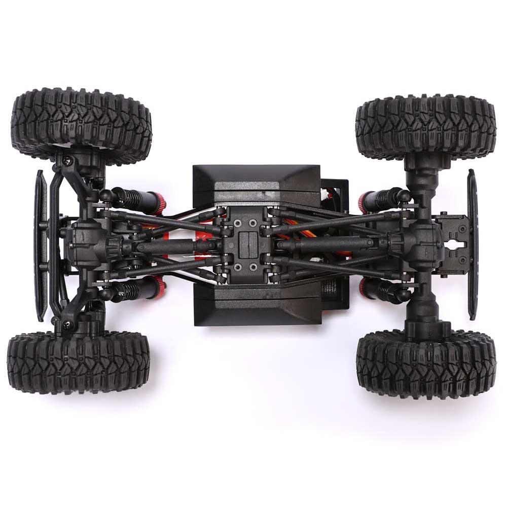 Redcat Ascent-18 RC off-road truck chassis with red and black components, showcasing the detailed frame and suspension system.