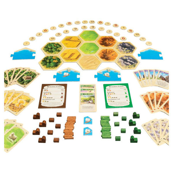 Catan Studio 5-6 Player Extension for Catan board game showing game pieces and colorful game board setup.