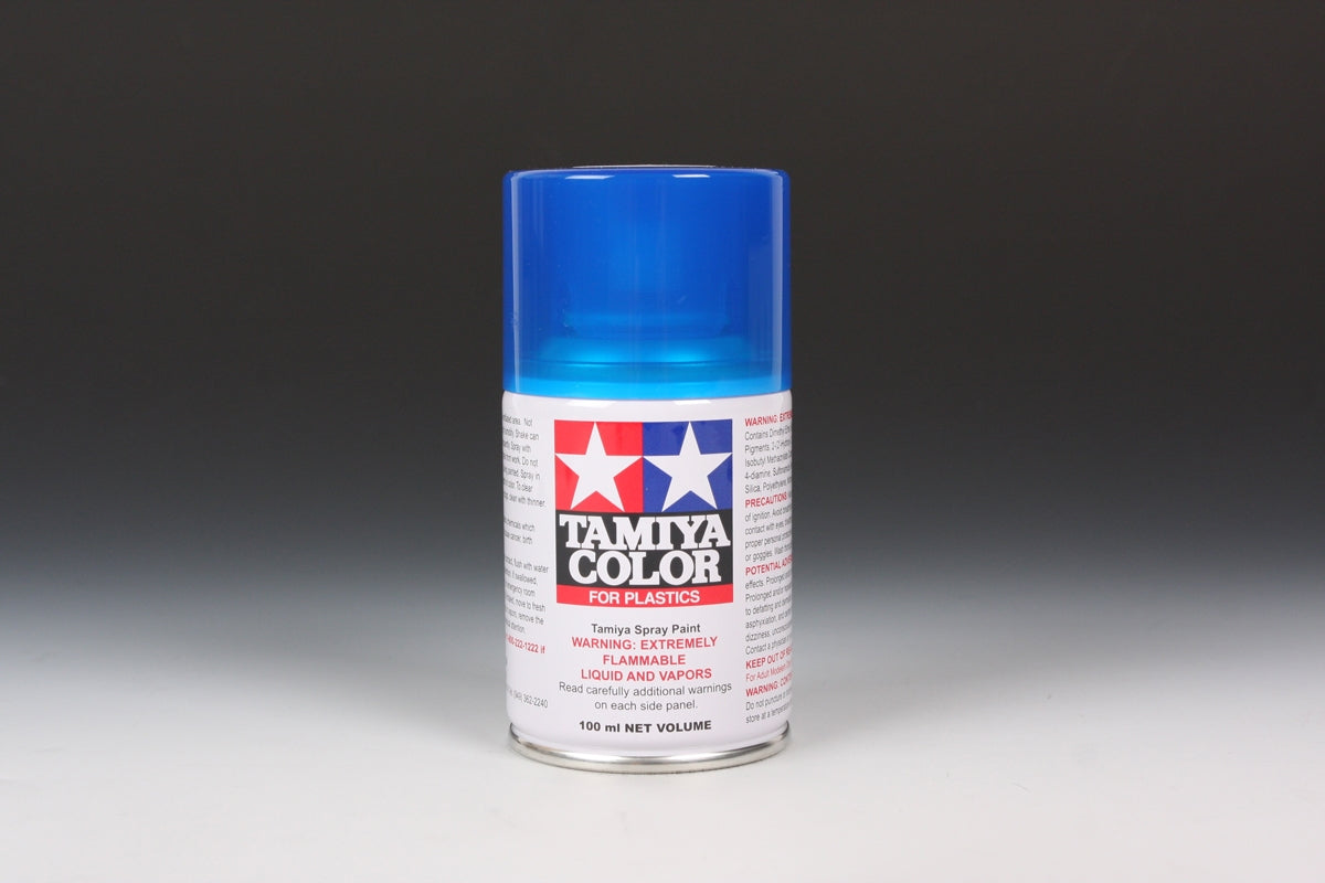 Tamiya TS-72 Clear Blue spray paint can, 100ml, featuring blue-colored aerosol paint with spray nozzle for model or craft projects.