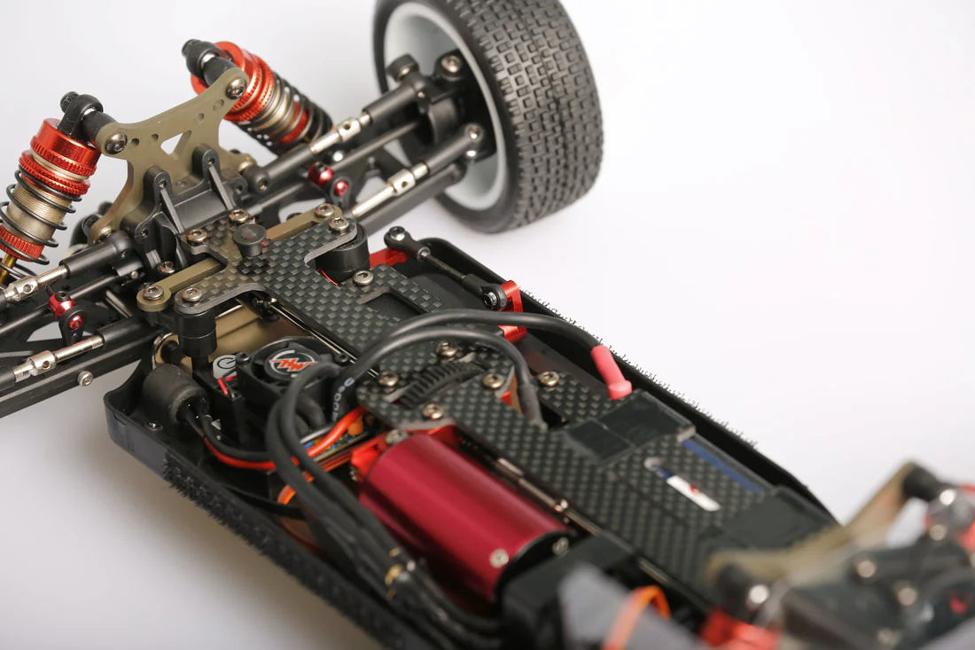 LC Racing LC12B1-HK 1/12 4WD competition buggy kit with motor and ESC, showing the assembled RC buggy ready for racing.