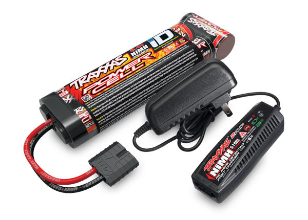 Traxxas 8.4V NiMH battery pack with 2-Amp AC charger for RC vehicles, shown with packaging and charging components.