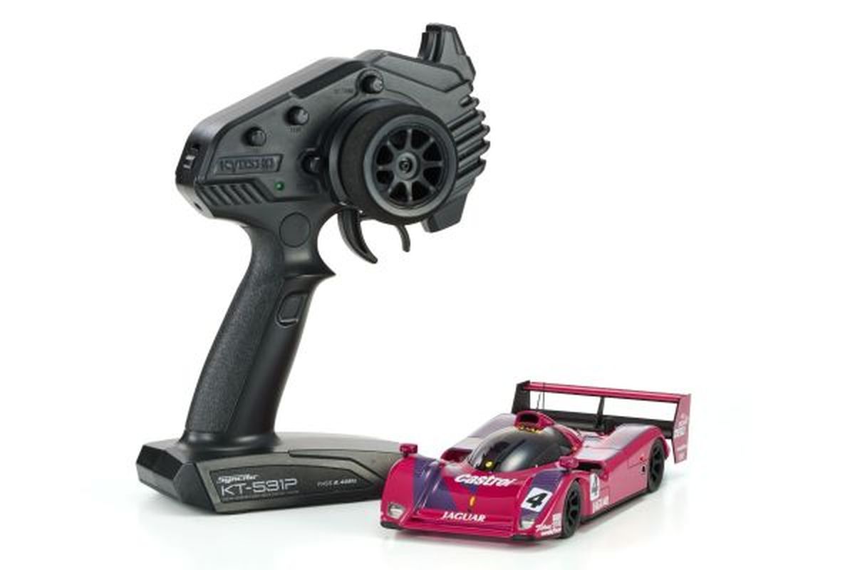 Kyosho Mini-Z RWD MR04 Jaguar XJR-14 remote control car on display, detailed scale model with sleek silver finish.