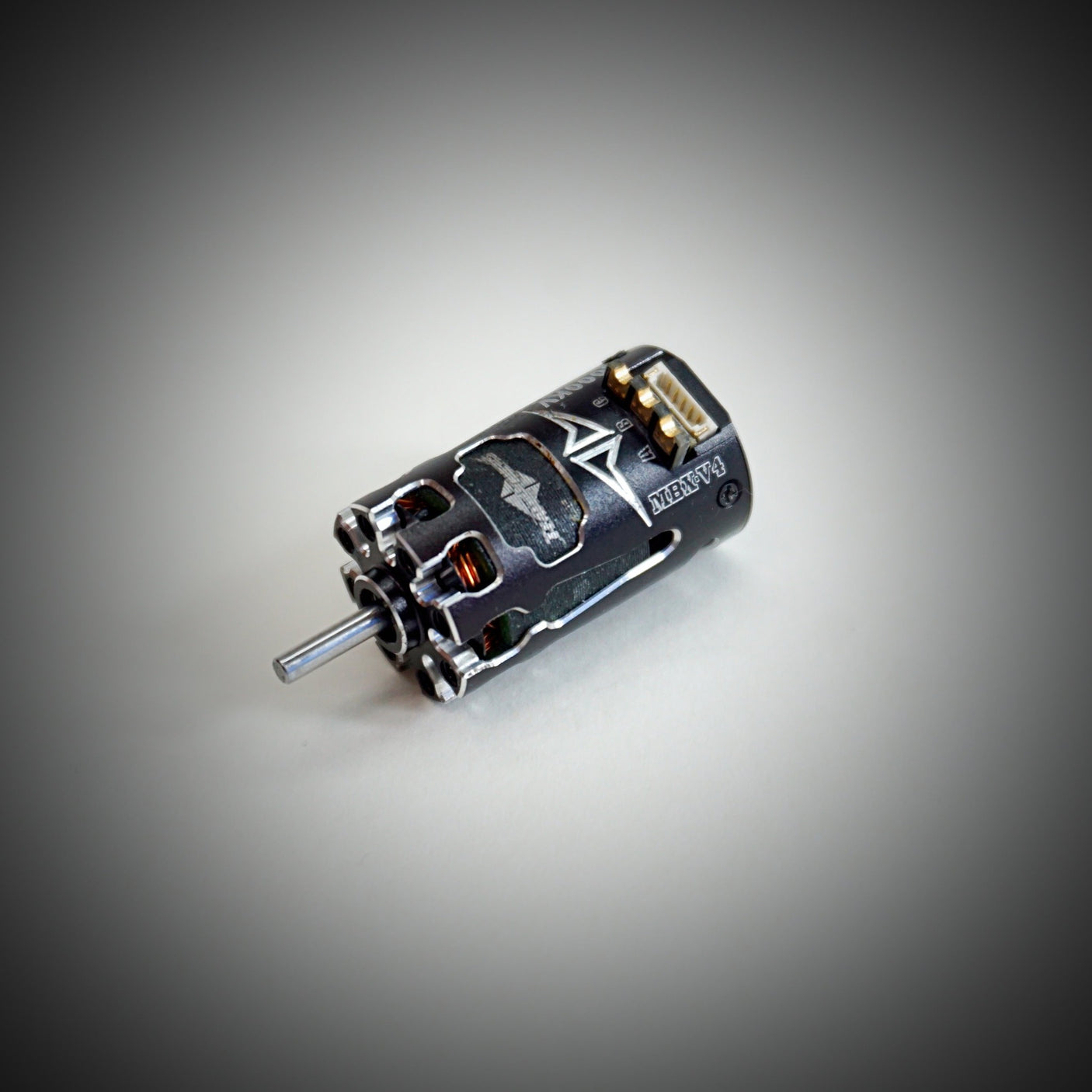 Team Powers MBX V4 Mini-Z RC car with sensored brushless motor, showing detailed view of the compact, high-performance vehicle.