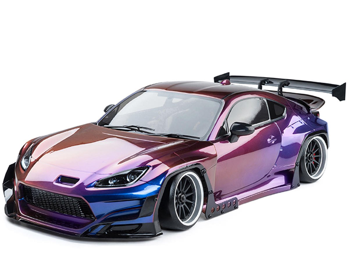 MST RMX 2.5 1/10 2WD brushless drift car in iridescent purple with GR86RB body, detailed exterior and racing tires.