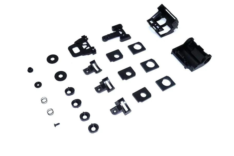 Kyosho Mini-Z MM2 motor case set for MR-04 RC car, showing the compact black plastic motor housing and components.
