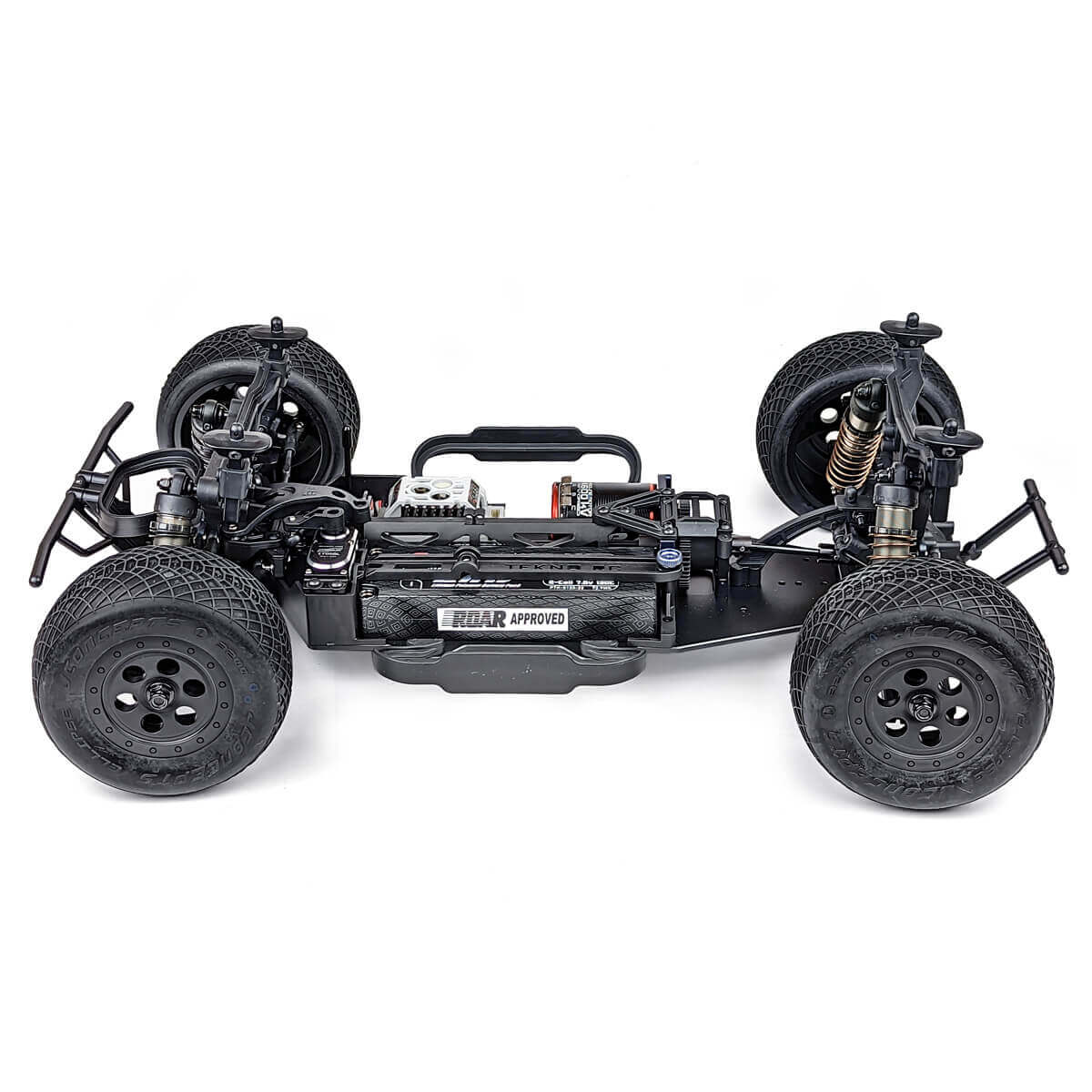 Tekno SCT410SL 1/10th scale 4x4 lightweight short course RC truck, driver side view with elevated angle