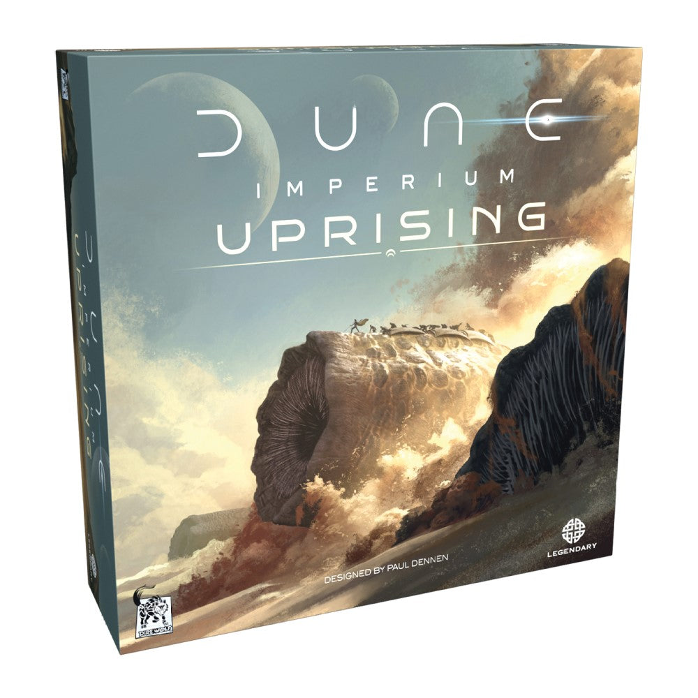 Dune: Imperium - Uprising expansion box by Dire Wolf featuring artwork of a sci-fi game with planets and characters.