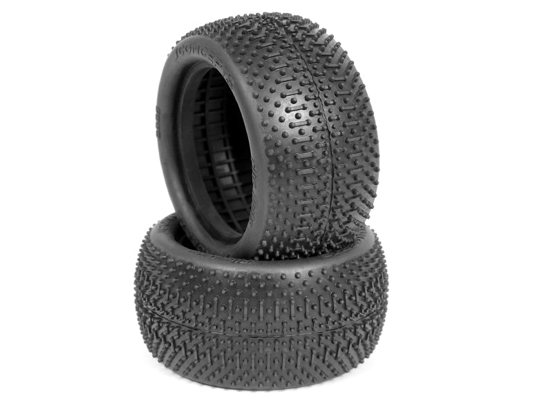 JConcepts Flip Outs 1/10 RC car buggy tires in green compound with 2.2-inch size, showing tread pattern and sidewall details.