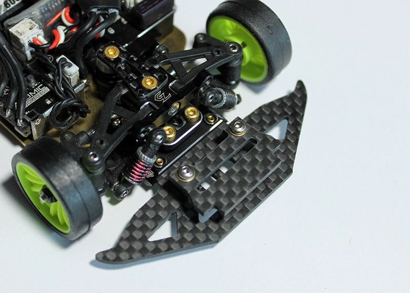 Reflex Racing RX511 Jomurema GT01 bumper and clip set for RC car, showing black plastic parts and mounting clips.
