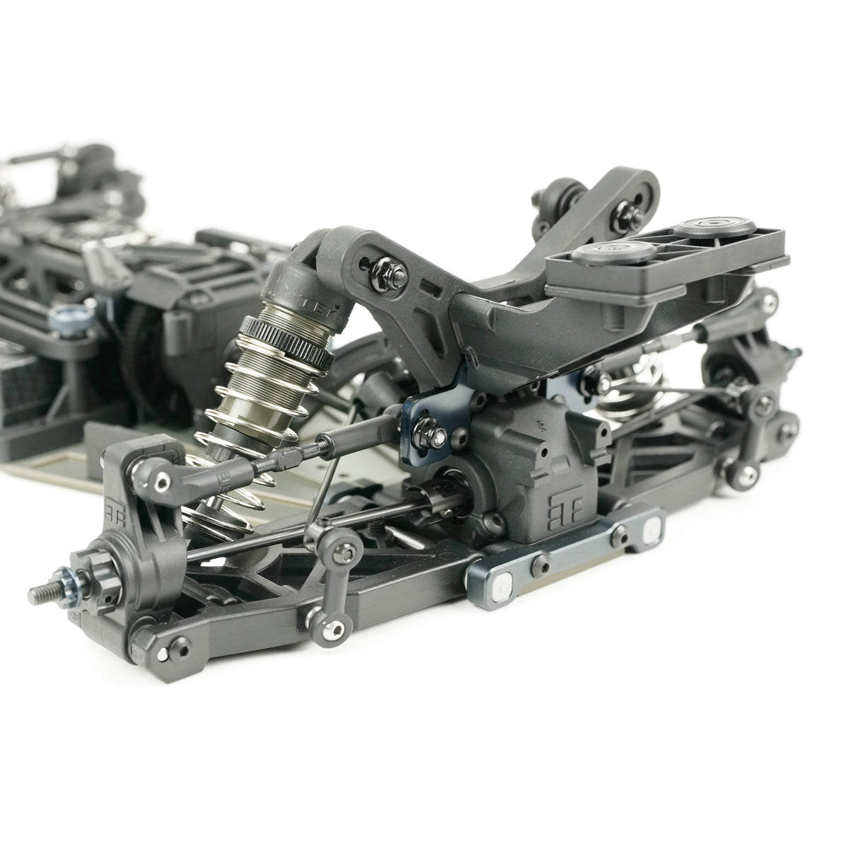Tekno EB410.2 1/10th scale 4WD electric RC buggy kit with detailed chassis and racing components for competitive RC racing.