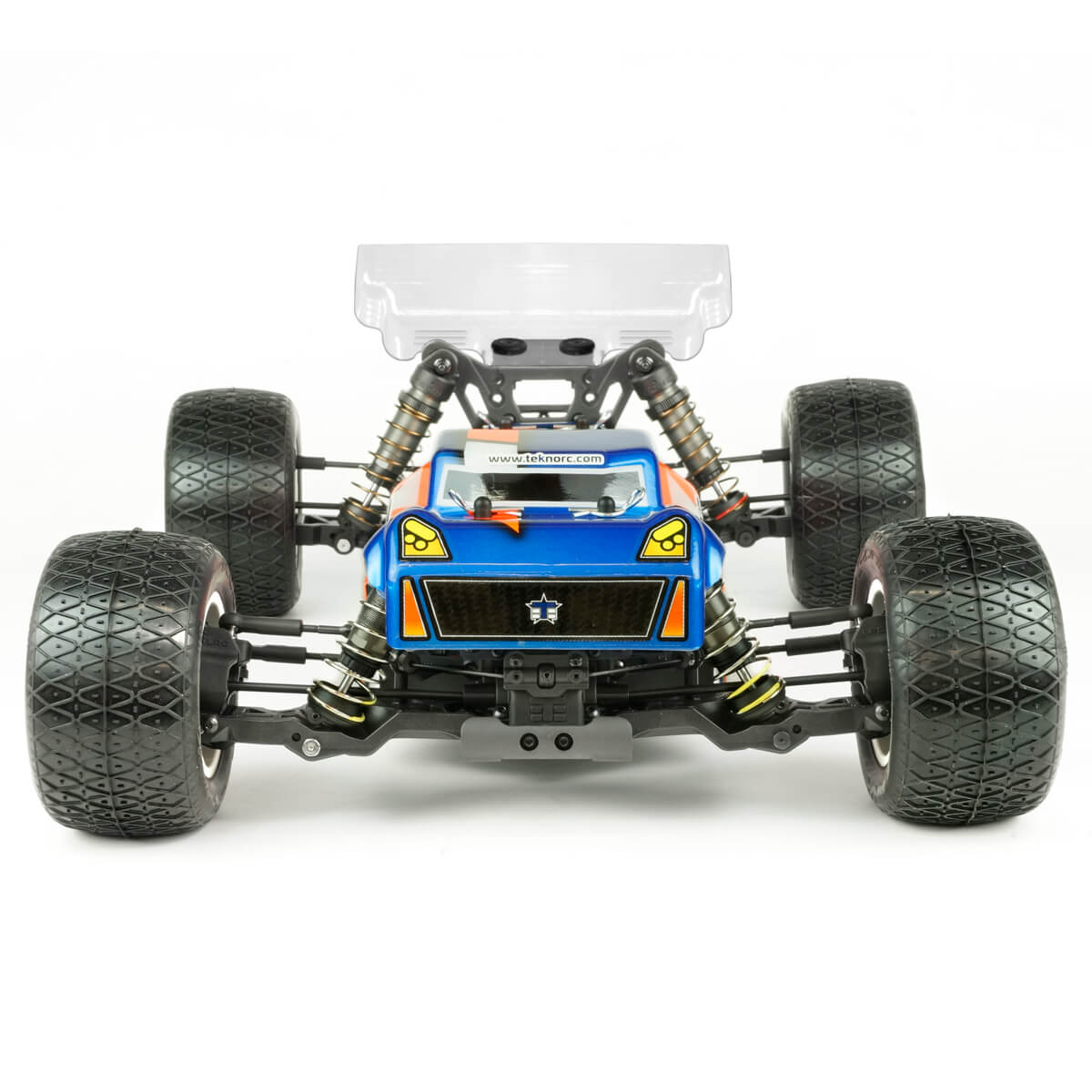 Tekno TKR7202 ET410.2 1/10th 4WD electric RC Truggy kit on a track, showcasing its sleek design and off-road tires.