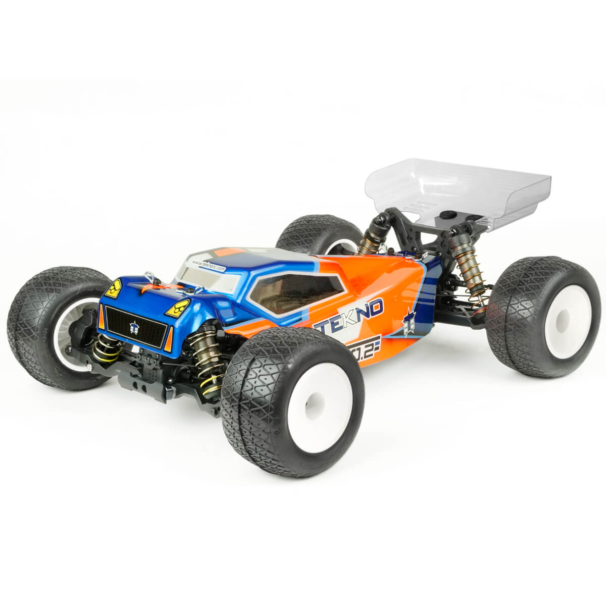 Tekno ET410.2 1/10th scale 4WD electric RC truggy kit on a track, showcasing its sleek design and off-road tires.