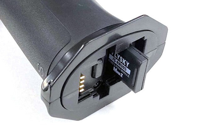 Flysky RM005 RC transmitter module for Mini-Z cars, compact electronic component with connection ports and branding visible