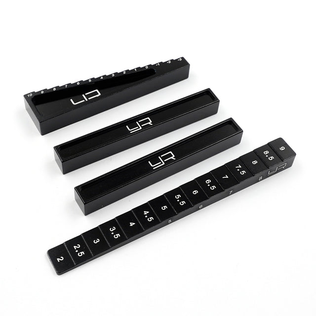 Black Yeah Racing chassis setting kit for 1:10 and 1:8 on-road RC cars, includes various adjustment tools and components.