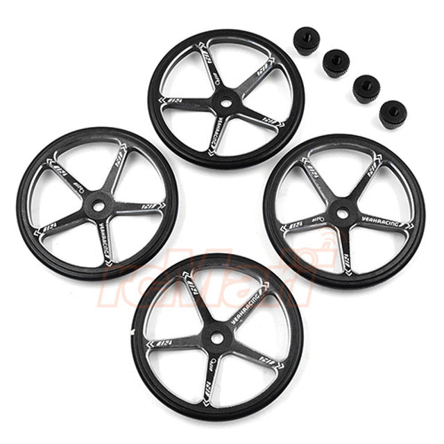 Black aluminum set up wheels for 1:10 M-Chassis RC cars by Yeah Racing, shown with detailed design and smooth finish.