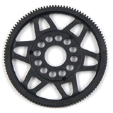 Xpress 64P composite spur gear showing teeth and gear structure for RC car or mechanical applications.