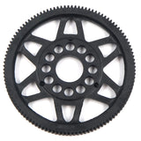 Xpress 64P composite spur gear, black and silver with gear teeth, designed for RC car or machinery applications.