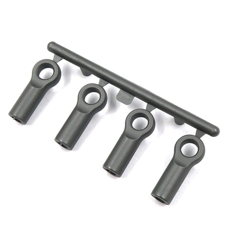 Set of four Xpress 4.8x15mm composite ball cups for RC car suspensions with black finish and durable construction.