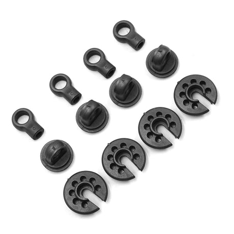 Grey composite shock parts for Xpress RC vehicles, featuring durable construction and precise fitment in a compact design.
