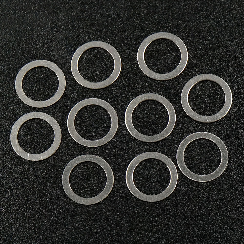 Set of 10 Xpress 5x7x0.2mm drive axle shims for precise axle adjustments, shown in the image.