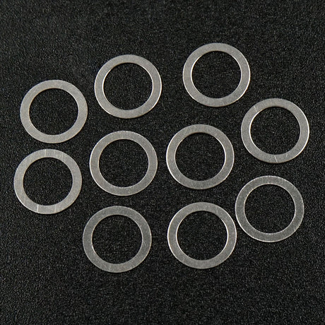 Set of 10 Xpress 5x7x0.2mm drive axle shims for precise axle adjustments, shown in the image.