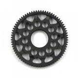 Xpress Xpress: 64P composite spur gear shown in detailed close-up, highlighting its gear teeth and durable plastic construction.